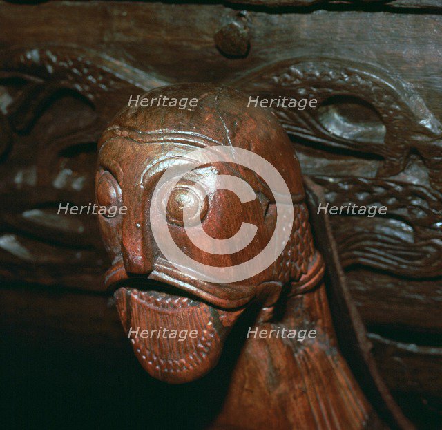 Carved head detail from a cart in the Oseburg Viking ship burial, 9th century. Artist: Unknown
