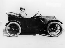 Sir Herbert Austin in an Austin Seven, 1922. Artist: Unknown