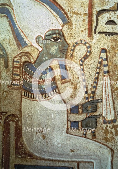 Funerary stela representing god Osiris, made in polychromed limestone. From Thebes.