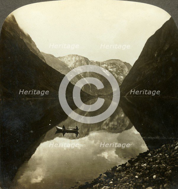 'Looking down the deep, still Naerofjord, from near Gudvangen, Norway', c1905. Creator: Unknown.