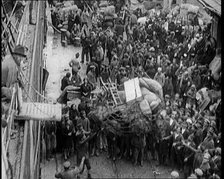 Greek People Jostling for Red Cross Food Hand Outs, 1922. Creator: British Pathe Ltd.