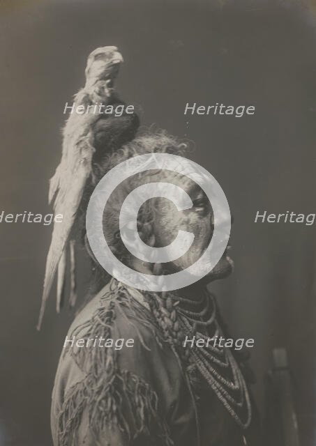 Two Whistles [A]-Apsaroke, c1908. Creator: Edward Sheriff Curtis.