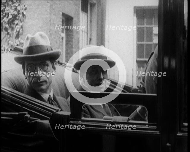 President of the Irish Republic Eamon De Valera Getting Into a Motorcar With a British Man..., 1921. Creator: British Pathe Ltd.