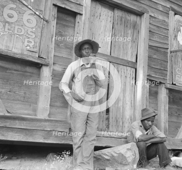 Tenant farmer and friend, Chatham County, North Carolina, 1939. Creator: Dorothea Lange.