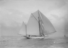 The yawl 'Celia' with full sail, 1912. Creator: Kirk & Sons of Cowes.