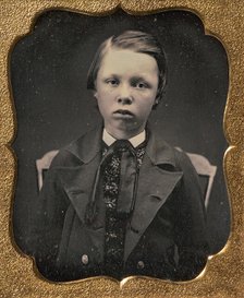 Boy in Wide Lapelled Coat, Seated in Chair, 1850s. Creator: Unknown.