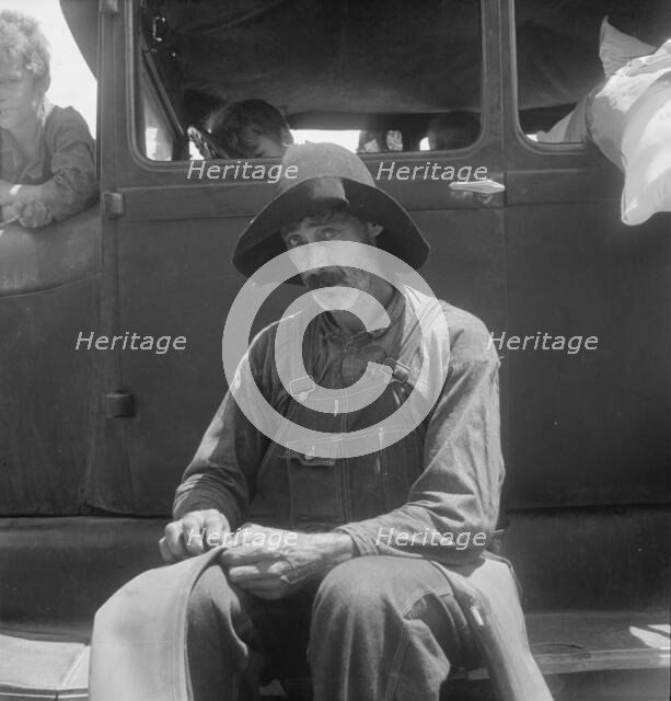 South Georgia tobacco sharecropper during the tobacco auction, Douglas, Georgia, 1938. Creator: Dorothea Lange.