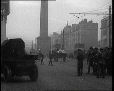 Crowds Parting and Being Held Back by Soldiers for Armoured Cars to Pass Through the Streets...,1920 Creator: British Pathe Ltd.