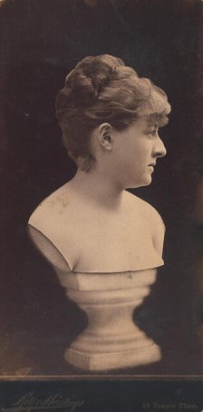 Female Portrait Bust on Pedestal, 1890s. Creator: Ritz & Hastings.