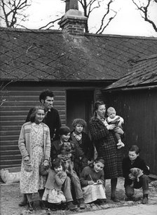 Travelling gipsy family re-housed in a bungalow, Beare Green, Surrey, 1964.