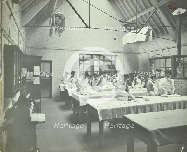 The ironing room, Battersea Polytechnic, London, 1907. Artist: Unknown.