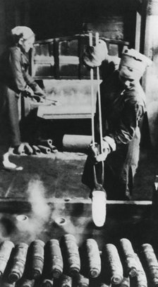 Women manufacturing shell casings in a Russian factory, World War II, 1943. Artist: Unknown