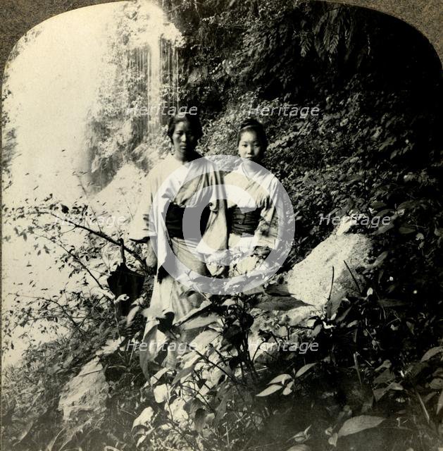 'Maidens of the Land of the Rising Sun, beneath the Kogijoku waterfalls...', c1900.  . Creator: Unknown.
