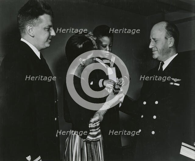 Mrs. Charles W. David, Jr.; African American widow and her three-year-old son, Neil..., 1939 - 1945. Creator: United States Coast Guard.