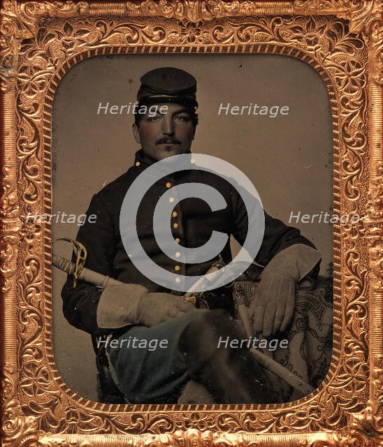 Union Cavalry Soldier, Seated, with Sword and Handgun, 1861-65. Creator: Unknown.