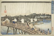Rain at Nihonbashi Bridge (Nihonbashi no hakuu), from the series "Famous Places in the..., c1832/38. Creator: Ando Hiroshige.