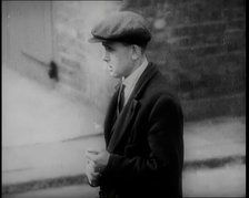 Male Civilians Standing in the Streets, 1926. Creator: British Pathe Ltd.