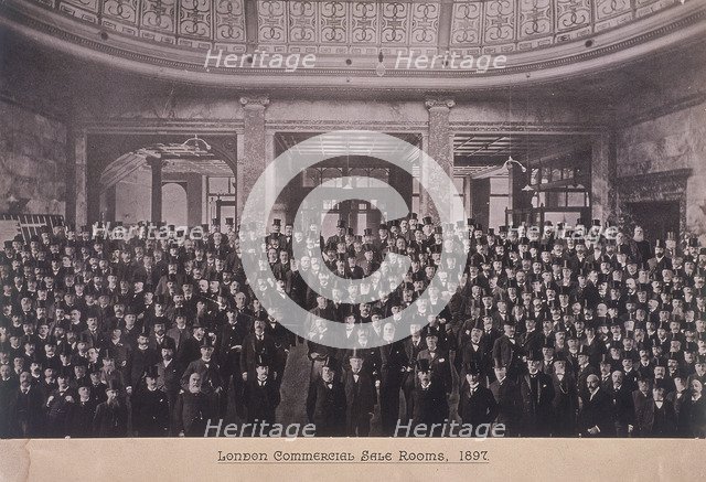 Group portrait of men in the London Commercial Sale Rooms, Mincing Lane, London, 1897. Artist: Anon