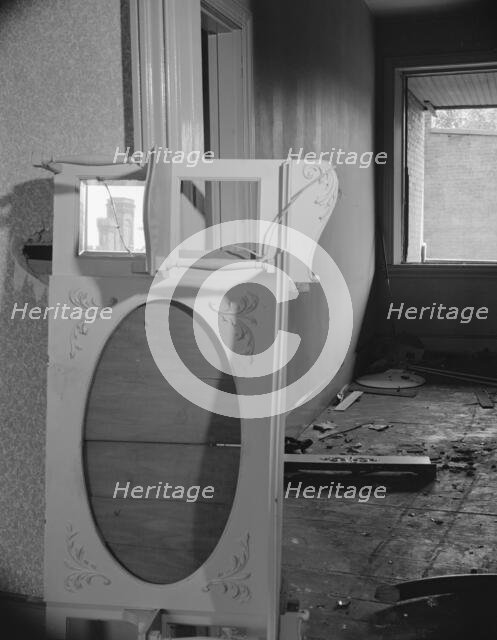 Interiors of wrecked homes on Independence Avenue..., Washington, D.C, 1942. Creator: Gordon Parks.