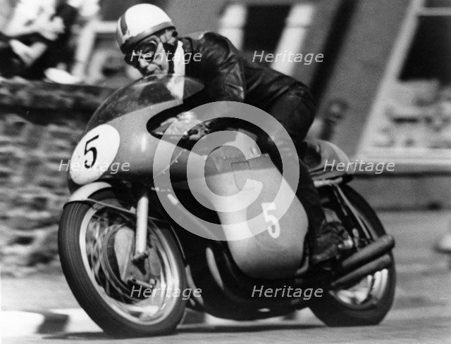 John Surtees winning the Isle of Man Junior TT, on an MV Agusta, 1959. Artist: Unknown