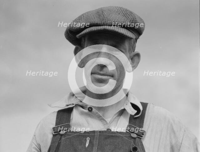 Father of landless sharecropper family, Macon County, Georgia, 1937. Creator: Dorothea Lange.