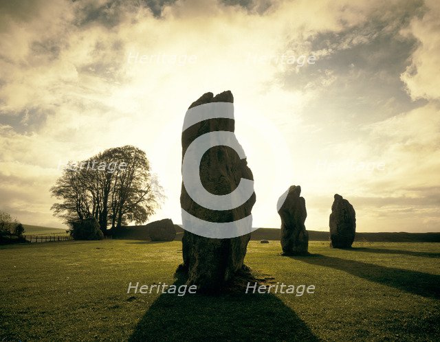 Sunrise over the stones, Avebury Stone Circle, Wiltshire, 1990. Artist: Unknown