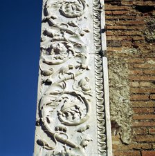 Decoration on the jamb of the dooway of the Building of Eumachia in the Forum, Pompeii, Italy. Creator: Unknown.