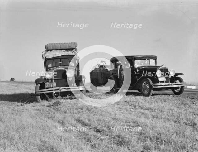 Two families originating from Independence, Kansas, on U.S. 99, between Tulare and Fresno, 1939. Creator: Dorothea Lange.