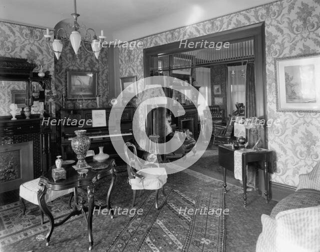 Douglas residence, parlors with arch between, Detroit, Mich., between 1905 and 1915. Creator: Unknown.
