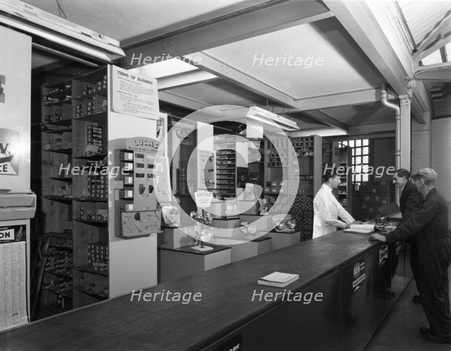 Shop counter, Globe & Simpson auto electrical engineers, Nottingham, Nottinghamshire, 1961.  Artist: Michael Walters