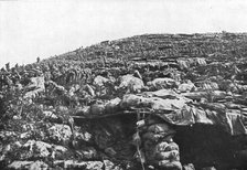 'Sur le front Italien, apres Gorizia ; renforts italiens escaladant les pentes abruptes de la cote 2 Creator: Unknown.