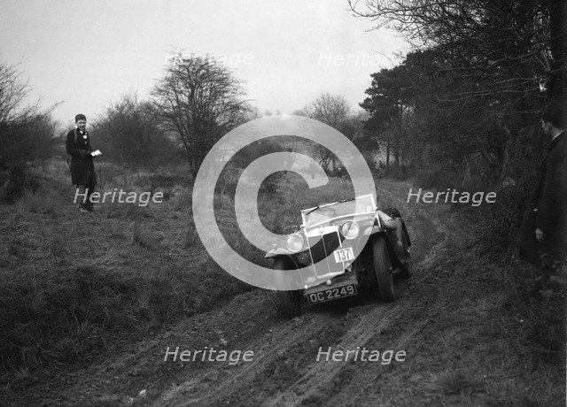 MG Magna of KC Delingpole at the Sunbac Colmore Trial, near Winchcombe, Gloucestershire, 1934. Artist: Bill Brunell.