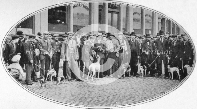 Dog sellers and buyers in the East End, London, c1900 (1901). Artist: Unknown.