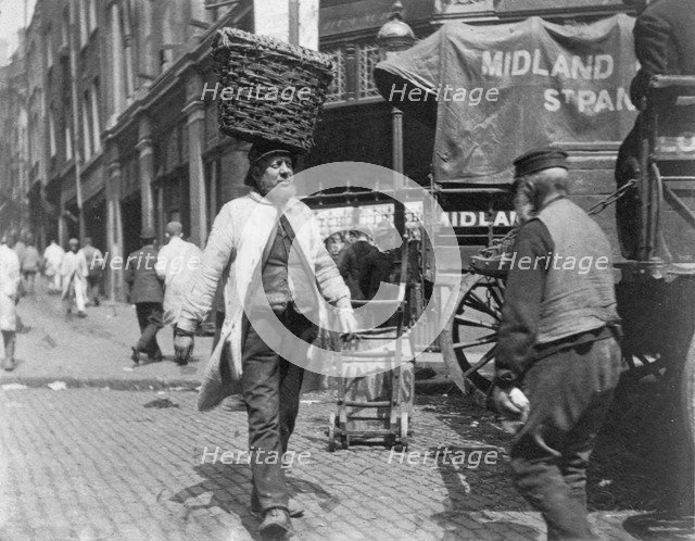 Fish porters at Billingsgate Market, London, 1893.  Artist: Paul Martin
