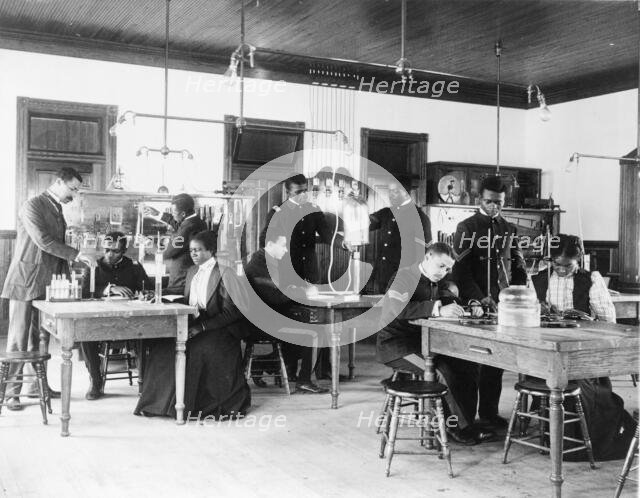 Class in capillary physics at Hampton Institute, Hampton, Virginia, 1899 and 1900. Creator: Frances Benjamin Johnston.