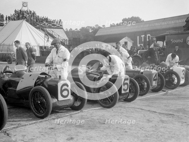 Austin 747 cc works racers of C Goodacre and JD Barnes, BRDC 500 Miles Race, Brooklands, 1931. Artist: Bill Brunell.