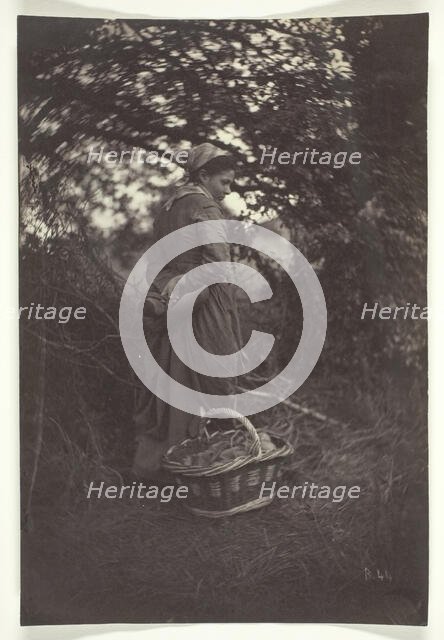 Woman Standing with Basket on Ground, 1870. Creator: Giraudon's Artist.