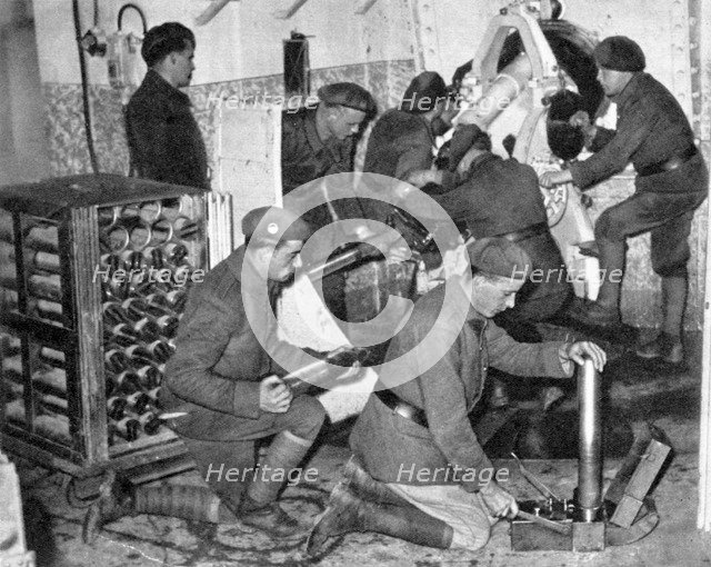 Troops working in one of the underground artillery towers, Maginot Line, Worls War 2, c1940. Artist: Unknown