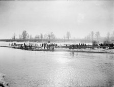 Rowing teams launching boats in the snow, Sandford on Thames, Oxfordshire, c1860-c1922. Artist: Henry Taunt