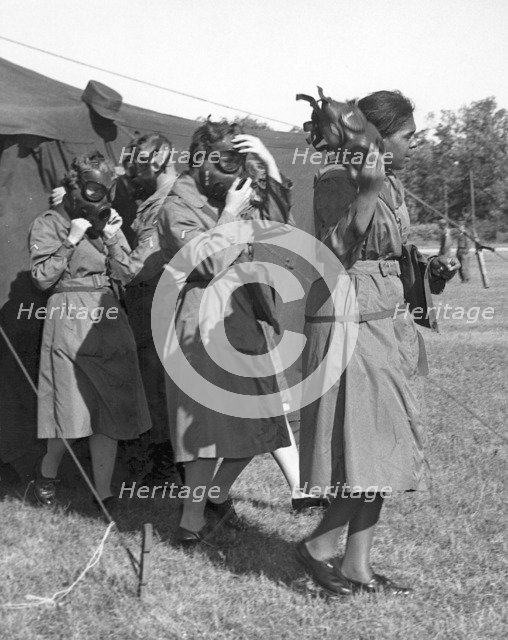 WACS emerging after gas chamber training, Fort Sheridan, Illinois, USA, 1964. Artist: SP5 Wigley