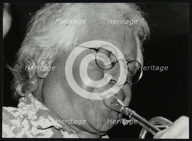 Trumpeter Henry Lowther playing at The Fairway, Welwyn Garden City, Hertfordshire, 1 October 2000. Artist: Denis Williams
