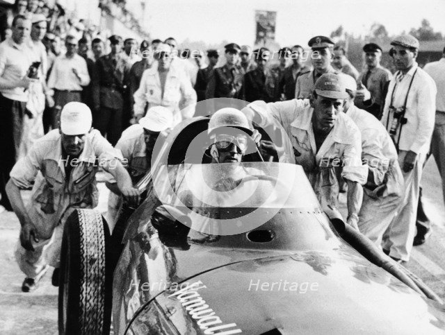 Stirling Moss in a Vanwall, Italian Grand Prix, Monza, 1957. Artist: Unknown