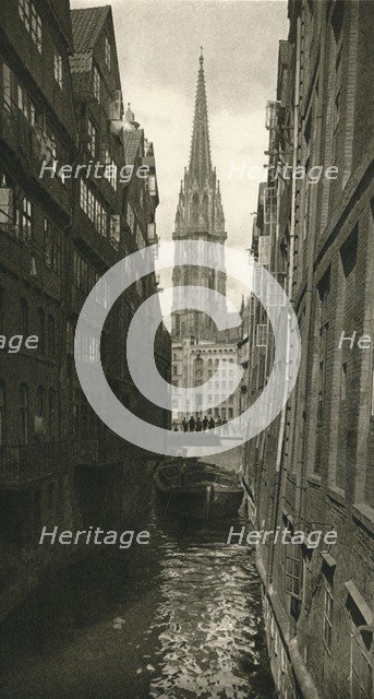 'Hamburg - Fleet with St. Nikolai Tower', 1931. Artist: Kurt Hielscher.