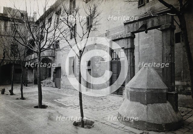 Hospital de la Santa Cruz, Barcelona: a long view of the courtyard; to the right can be seen the... Creator: Unknown.