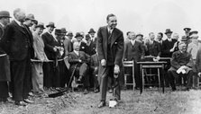 Edsel Ford turning the first sod at the site of Ford's plant at Dagenham, Essex, late 1920s. Artist: Unknown