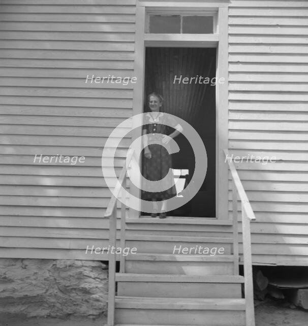 Possibly: Conversation among members of congregation, Wheeley's Church, Gordonton, N Carolina, 1939. Creator: Dorothea Lange.