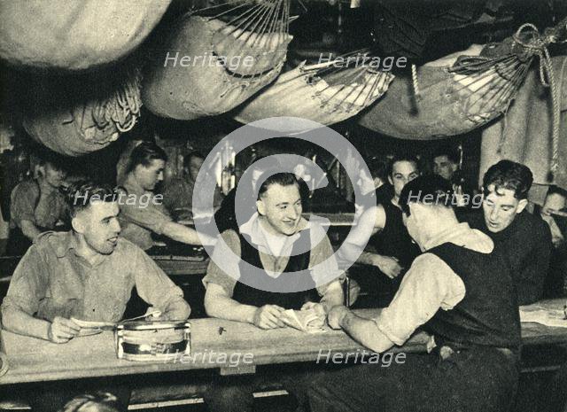 Royal Marines on their mess deck on board a ship, World War II, c1939-c1943 (1944). Creator: Unknown.