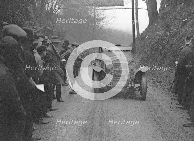 OM open 4-seater of PD Walker competing in the MCC Exeter Trial, 1928. Artist: Bill Brunell.