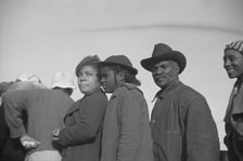 Possibly: Negroes in the lineup for food at mealtime in the camp..., Forrest City, Arkansas, 1937. Creator: Walker Evans.