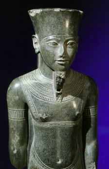 Schist statuette of the God Amun, Ancient Egyptian, 18th dynasty, 1334-1295 BC. Artist: Werner Forman